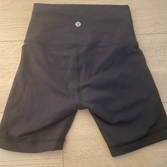 Black lululemon biker shorts perfect for workouts or everyday - Picture 2 of 3